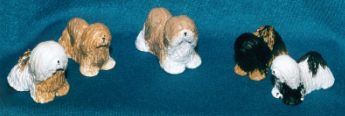 Lhasa Apso Figuren stehend und sitzend